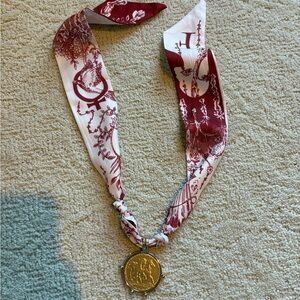 Red and White Scarf with Gold Pendant